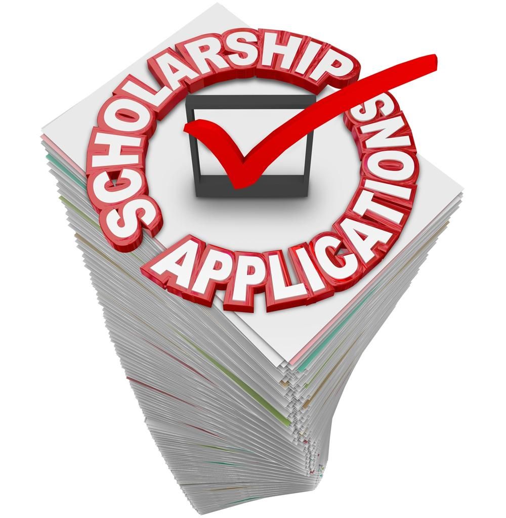  Scholarship application sign with checkmark on pile of papers