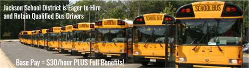 school buses lined up with announcement of pay